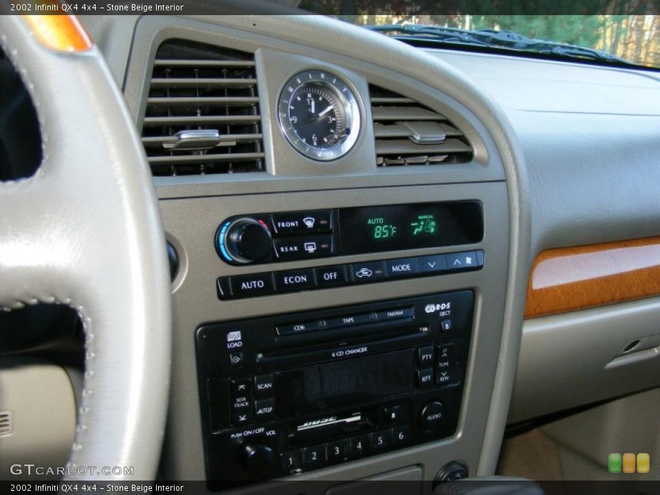 Stone Beige Interior Controls for the 2002 Infiniti QX4 4x4 #39515284