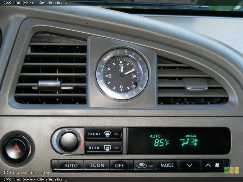 Stone Beige Interior Controls for the 2002 Infiniti QX4 4x4 #39515384
