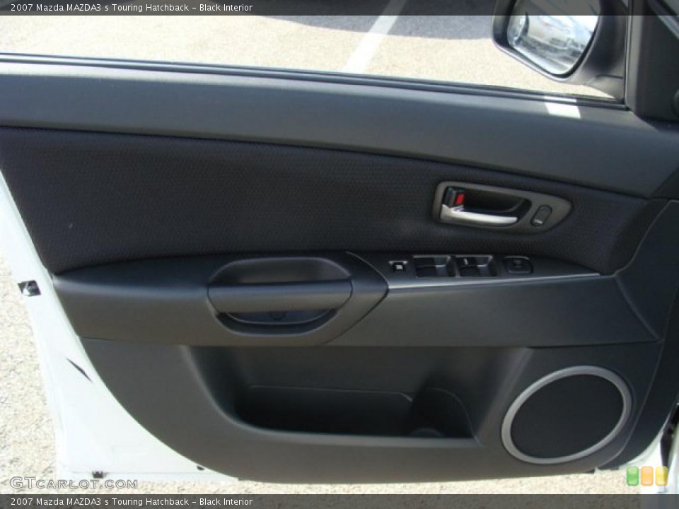 Black Interior Door Panel for the 2007 Mazda MAZDA3 s Touring Hatchback #39521985
