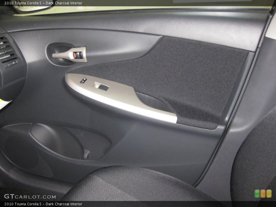 Dark Charcoal Interior Door Panel for the 2010 Toyota Corolla S #39522941