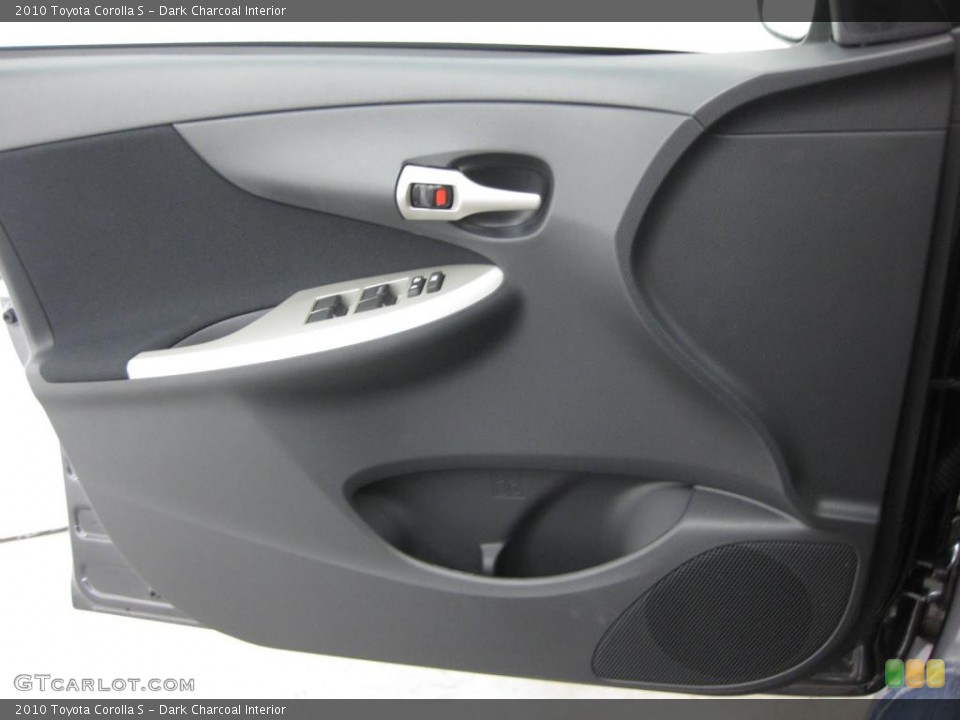 Dark Charcoal Interior Door Panel for the 2010 Toyota Corolla S #39522953