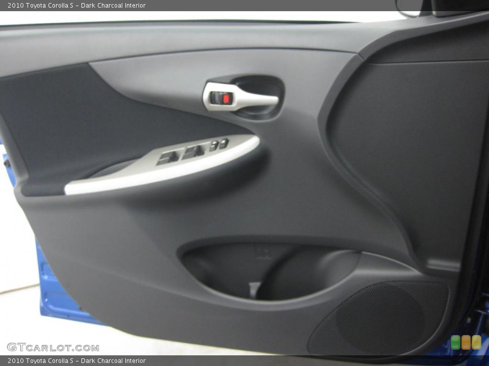 Dark Charcoal Interior Door Panel for the 2010 Toyota Corolla S #39526101