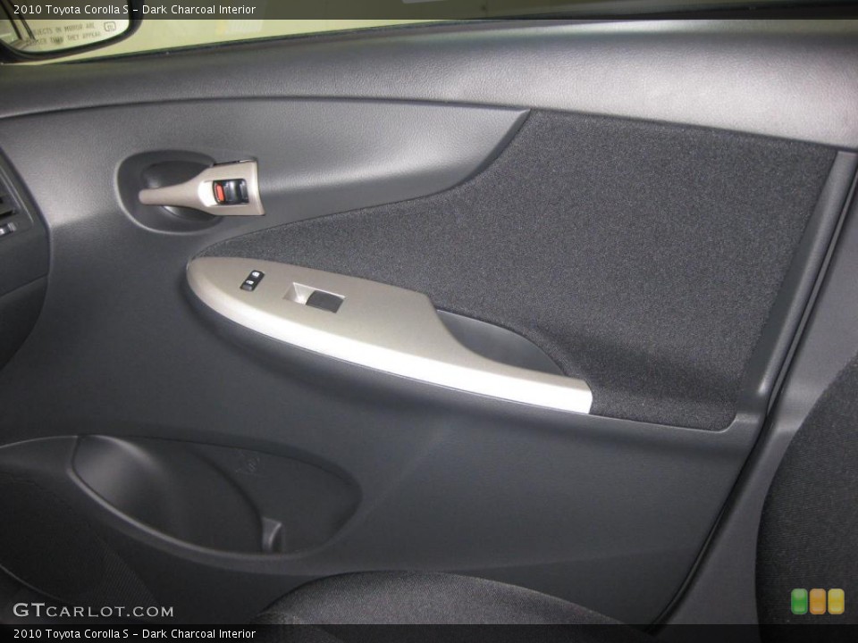 Dark Charcoal Interior Door Panel for the 2010 Toyota Corolla S #39526493
