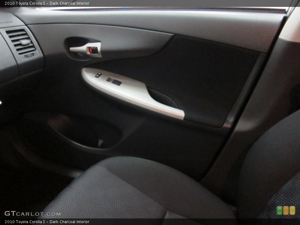 Dark Charcoal Interior Door Panel for the 2010 Toyota Corolla S #39530545