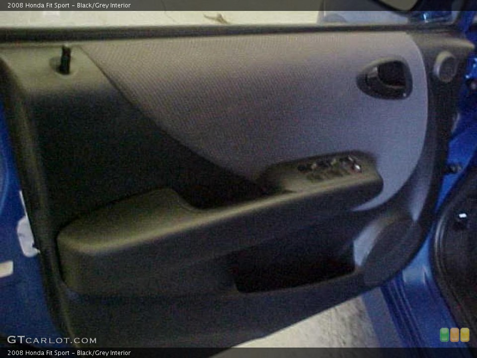 Black/Grey Interior Door Panel for the 2008 Honda Fit Sport #39545774