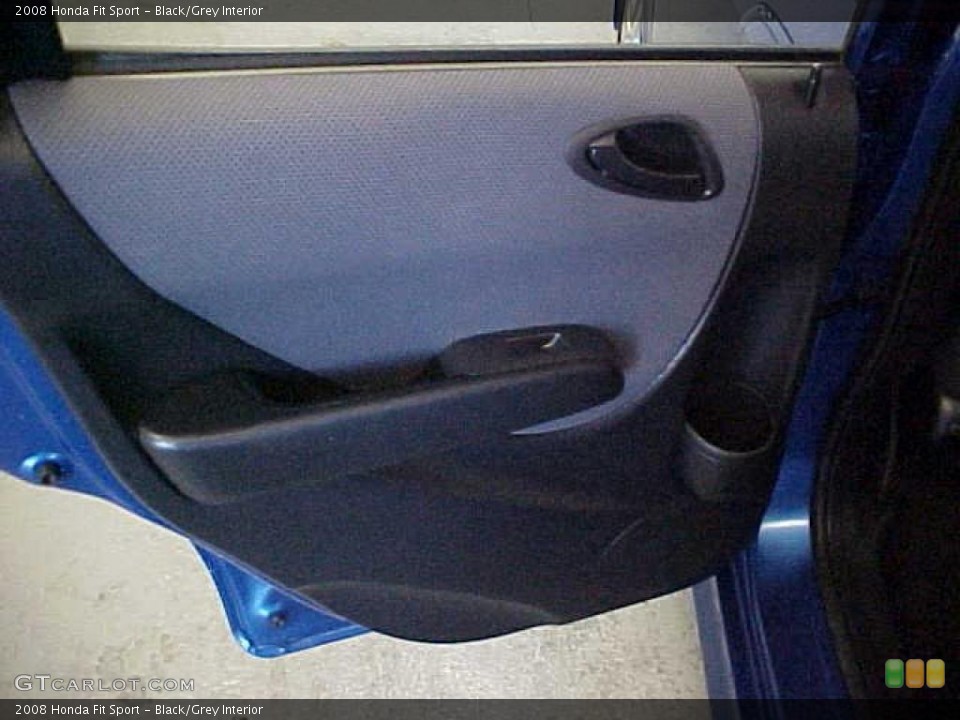 Black/Grey Interior Door Panel for the 2008 Honda Fit Sport #39545866