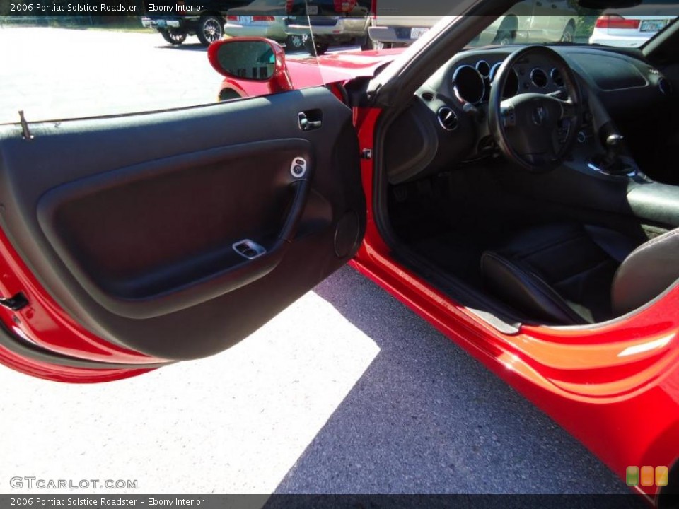 Ebony Interior Door Panel for the 2006 Pontiac Solstice Roadster #39554187