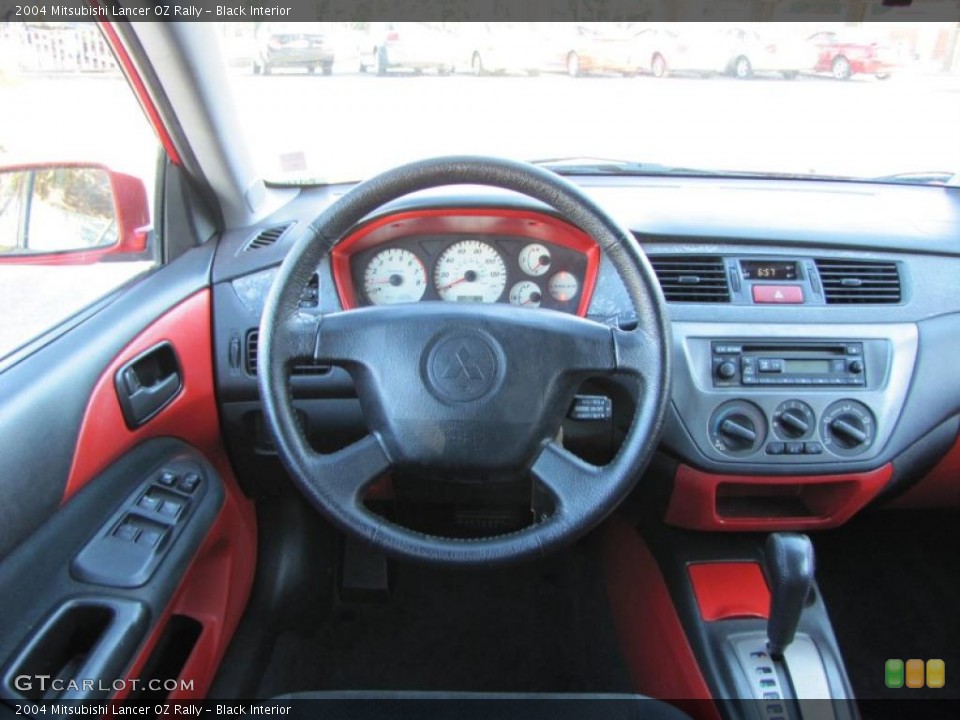 Black Interior Photo for the 2004 Mitsubishi Lancer OZ Rally #39593119