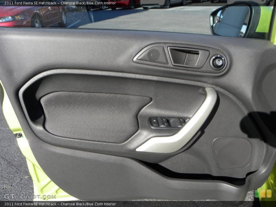 Charcoal Black/Blue Cloth Interior Door Panel for the 2011 Ford Fiesta SE Hatchback #39630322