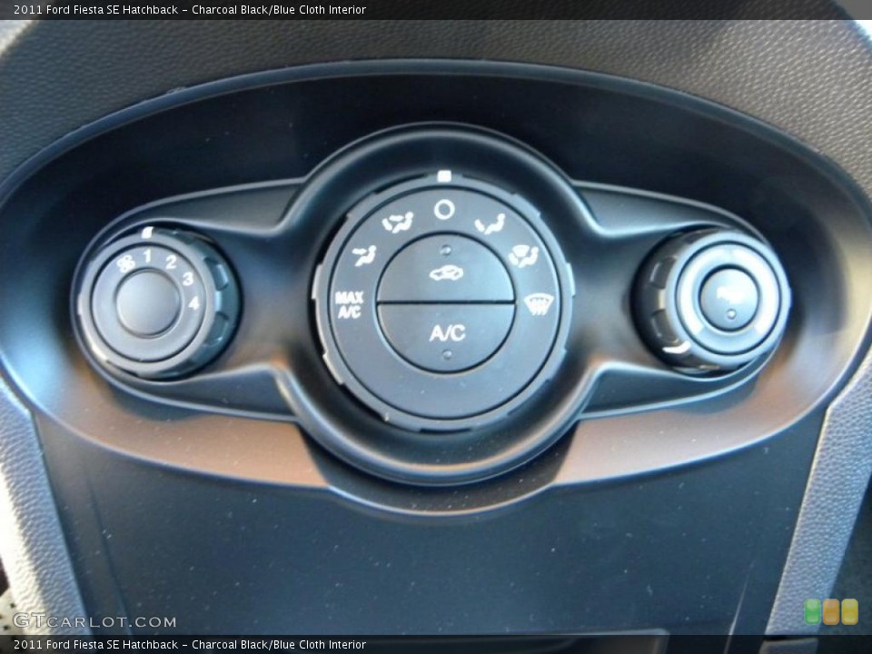 Charcoal Black/Blue Cloth Interior Controls for the 2011 Ford Fiesta SE Hatchback #39630386