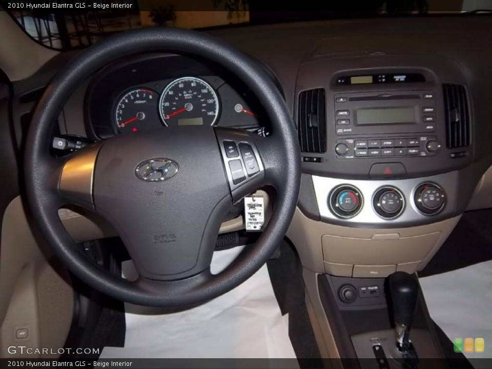 Beige Interior Dashboard for the 2010 Hyundai Elantra GLS #39645303