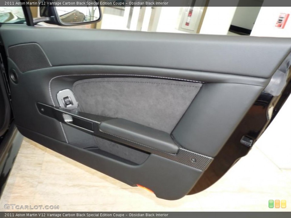 Obsidian Black Interior Door Panel for the 2011 Aston Martin V12 Vantage Carbon Black Special Edition Coupe #39664352