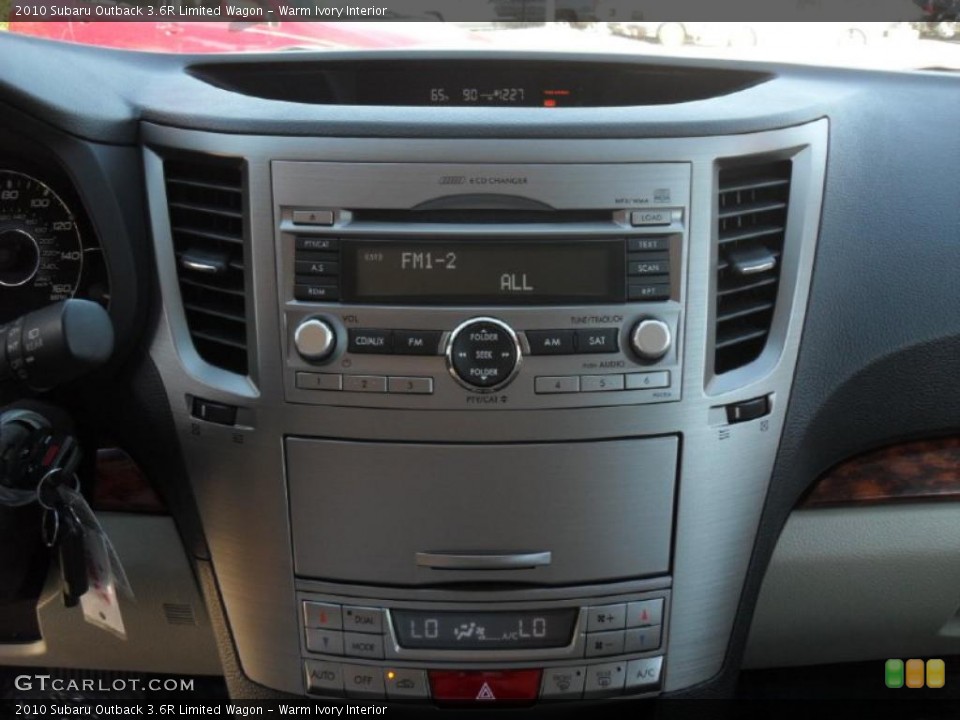 Warm Ivory Interior Controls for the 2010 Subaru Outback 3.6R Limited Wagon #39670479