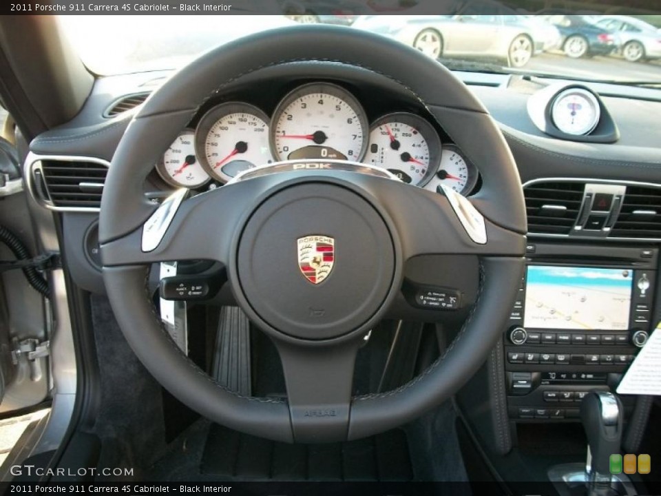 Black Interior Steering Wheel for the 2011 Porsche 911 Carrera 4S Cabriolet #39678551