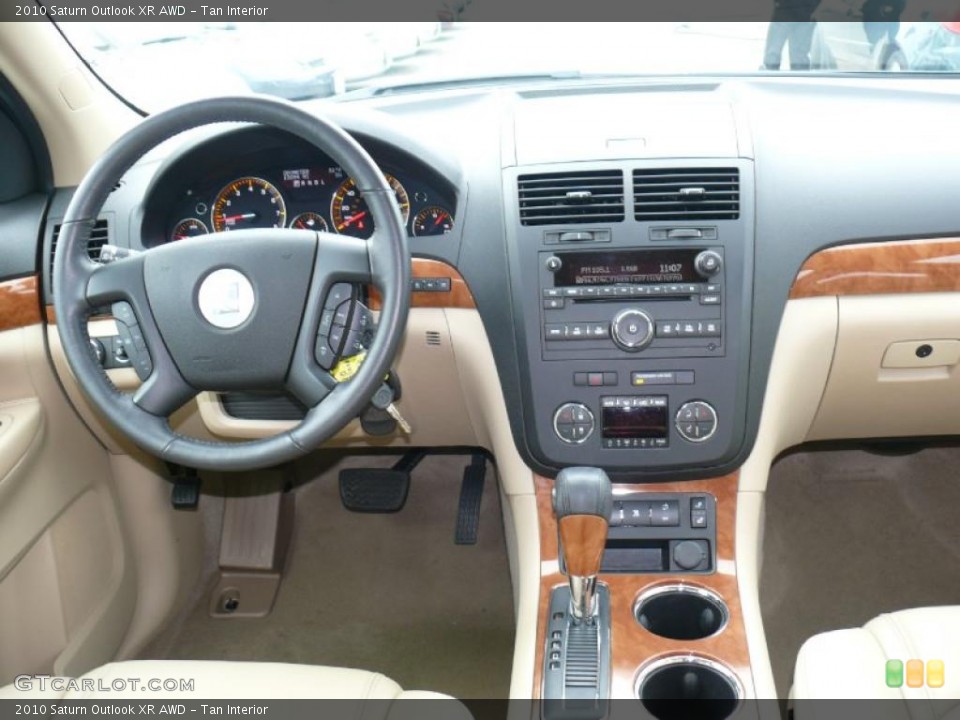 Tan Interior Dashboard for the 2010 Saturn Outlook XR AWD #39680019