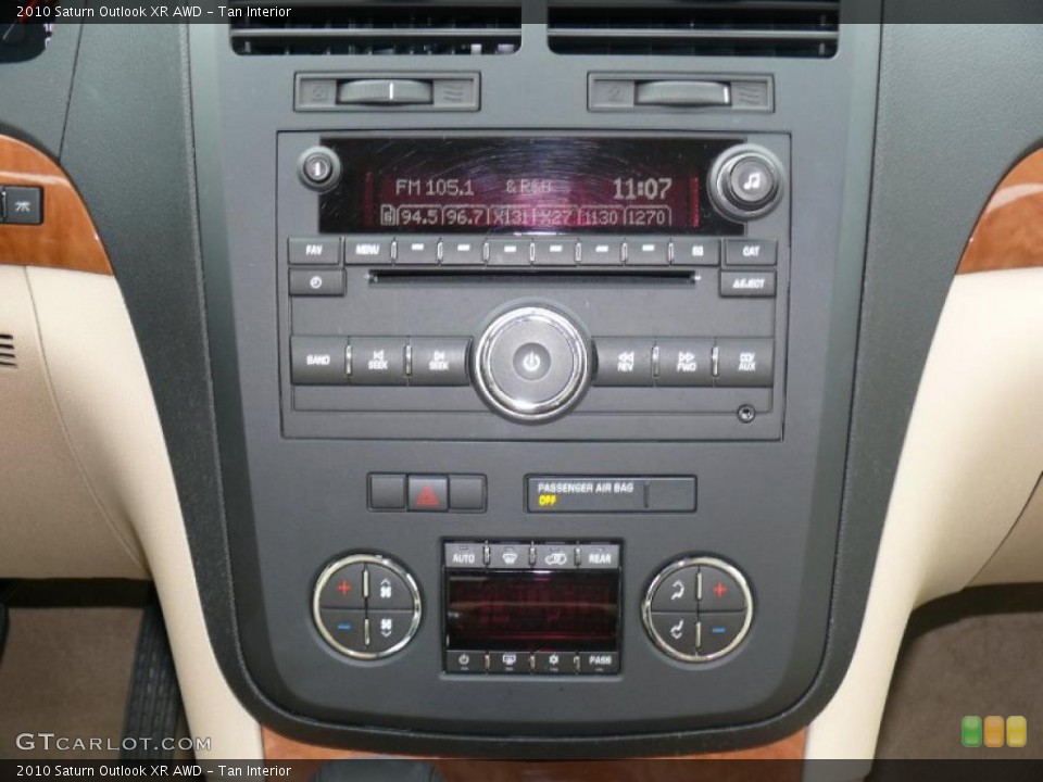 Tan Interior Controls for the 2010 Saturn Outlook XR AWD #39680039