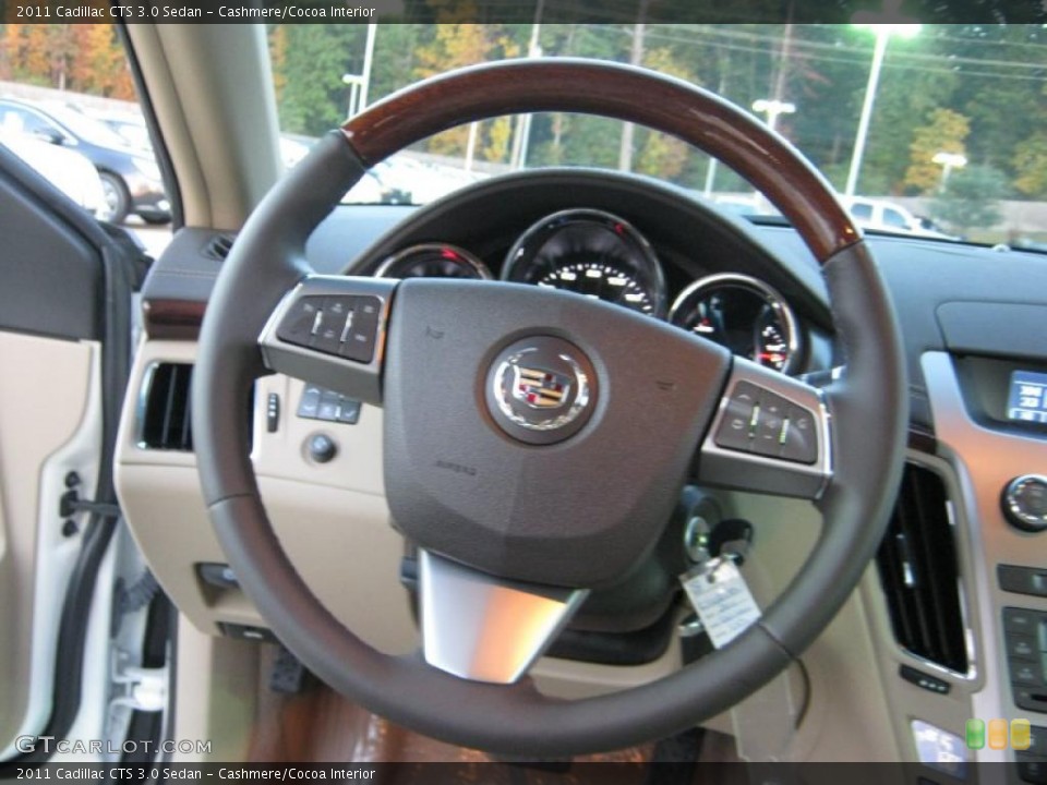 Cashmere/Cocoa Interior Steering Wheel for the 2011 Cadillac CTS 3.0 Sedan #39702963