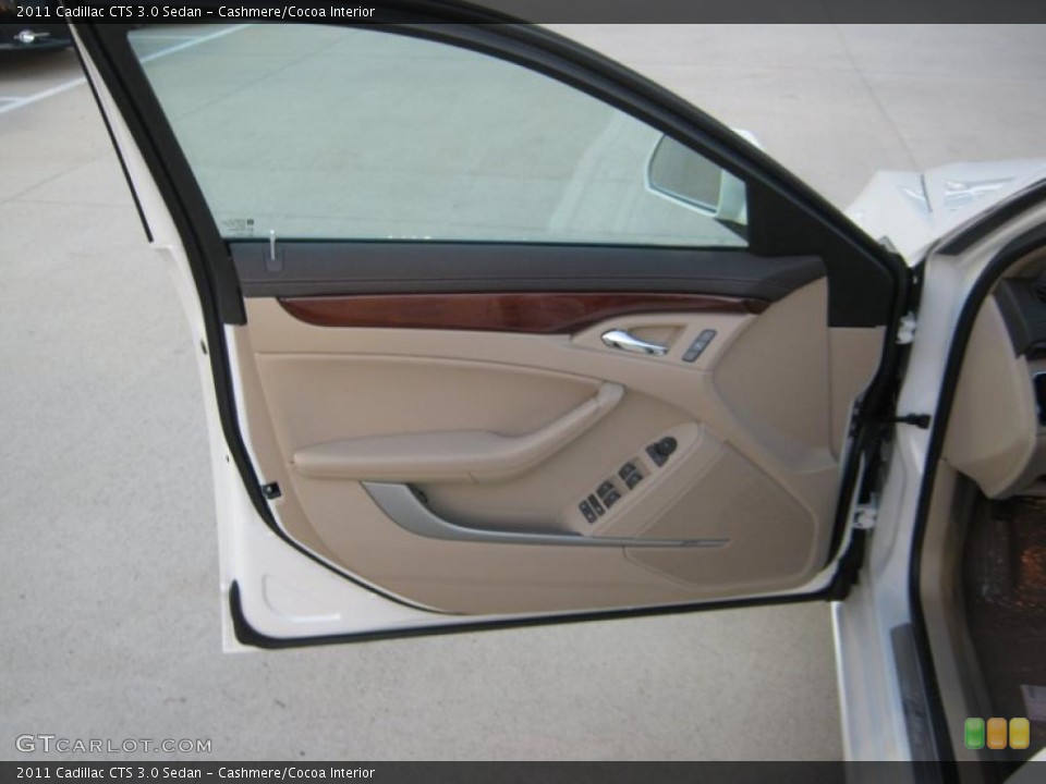 Cashmere/Cocoa Interior Door Panel for the 2011 Cadillac CTS 3.0 Sedan #39703055