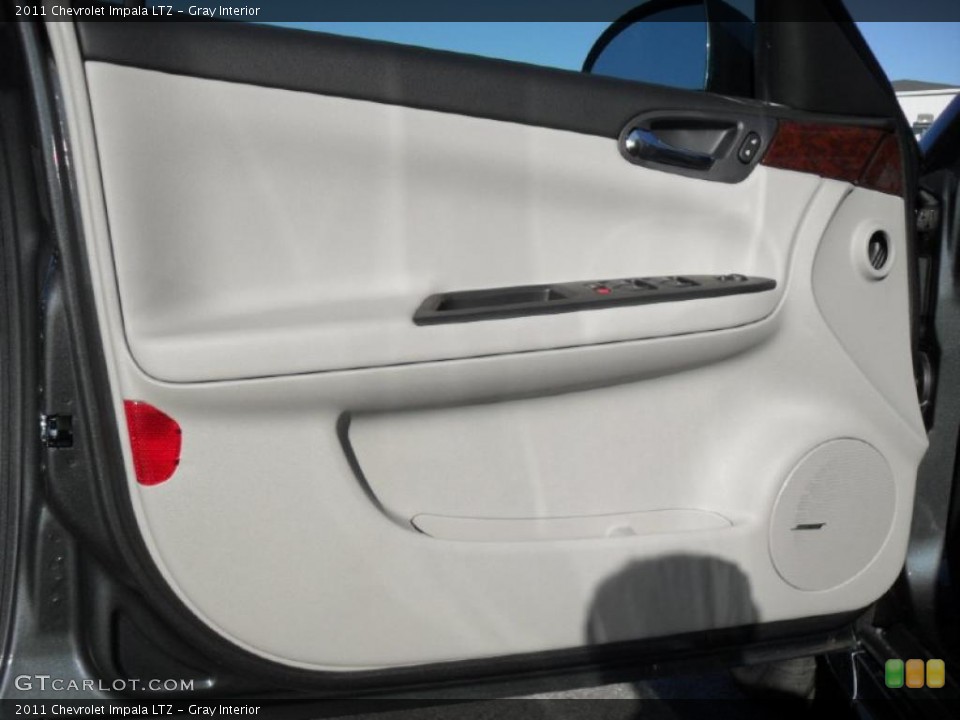 Gray Interior Door Panel for the 2011 Chevrolet Impala LTZ #39703075