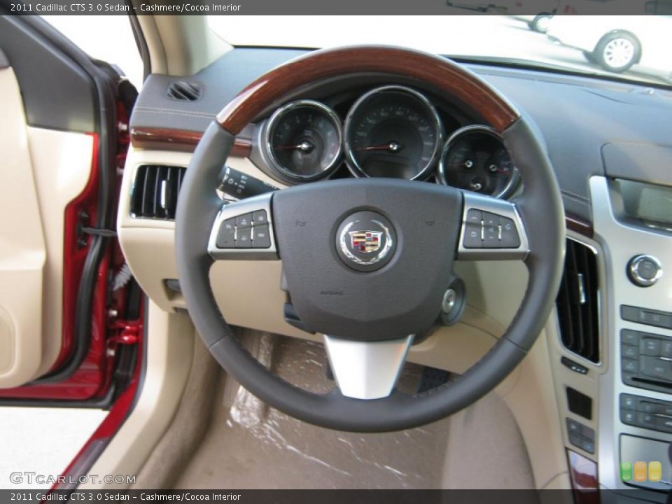 Cashmere/Cocoa Interior Steering Wheel for the 2011 Cadillac CTS 3.0 Sedan #39703395
