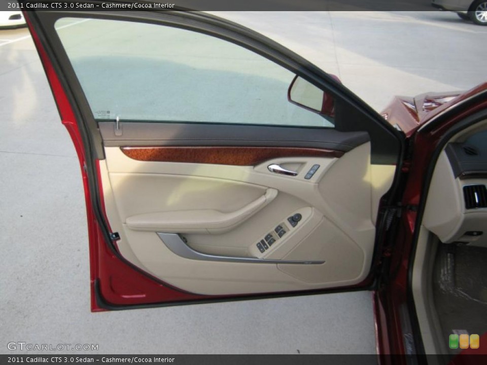 Cashmere/Cocoa Interior Door Panel for the 2011 Cadillac CTS 3.0 Sedan #39703491