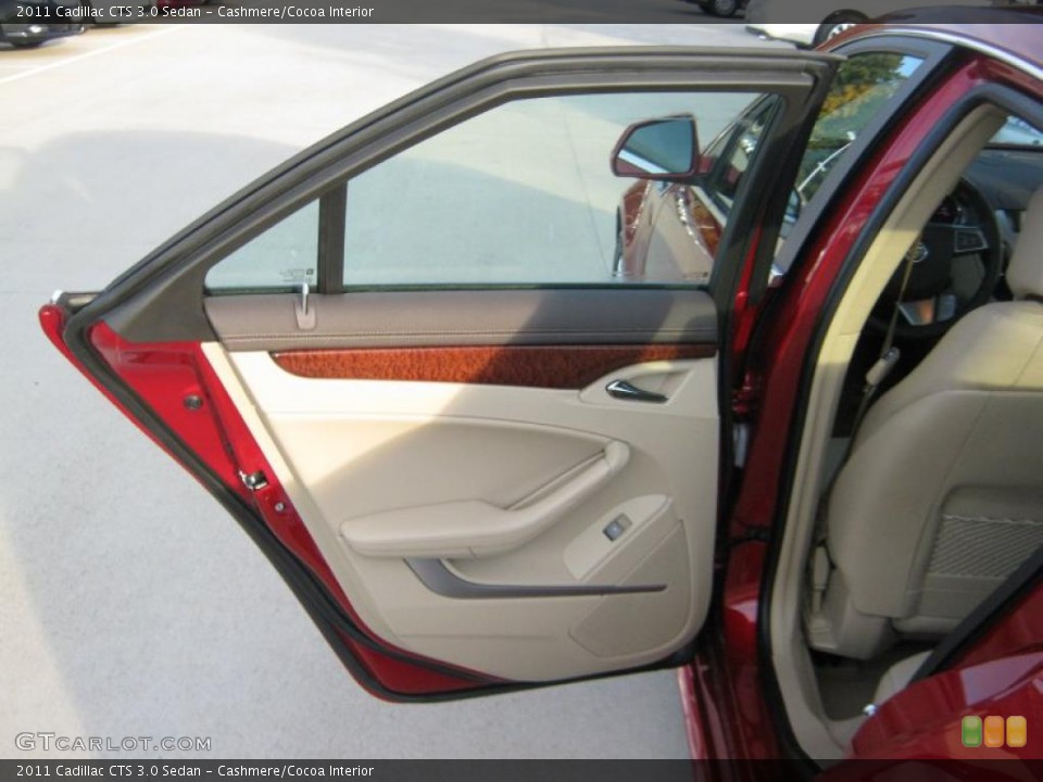 Cashmere/Cocoa Interior Door Panel for the 2011 Cadillac CTS 3.0 Sedan #39703543