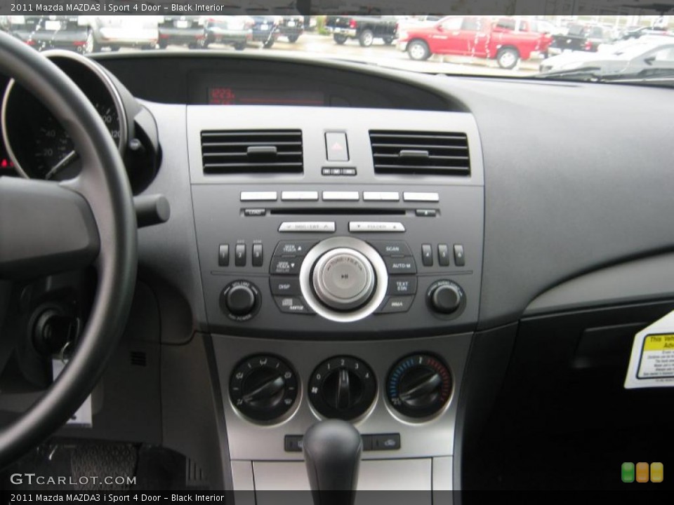 Black Interior Controls for the 2011 Mazda MAZDA3 i Sport 4 Door #39704247