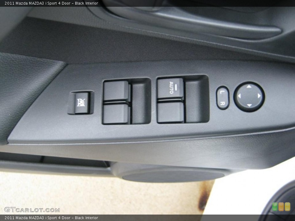 Black Interior Controls for the 2011 Mazda MAZDA3 i Sport 4 Door #39704367