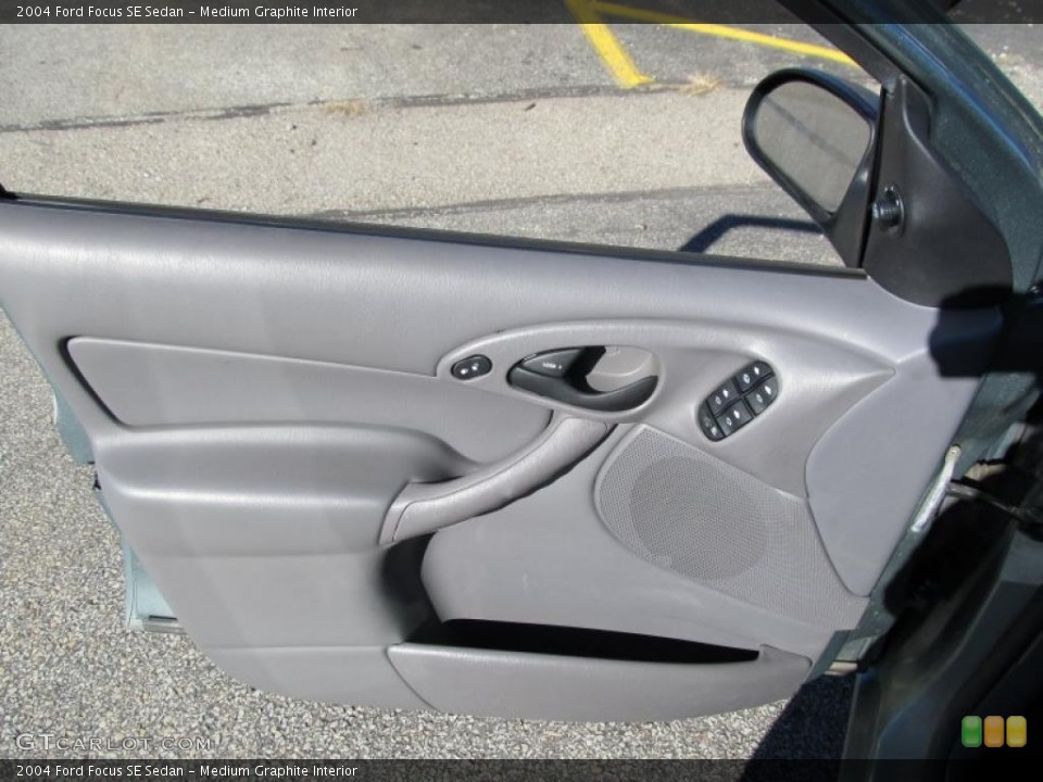 Medium Graphite Interior Door Panel for the 2004 Ford Focus SE Sedan #39715691