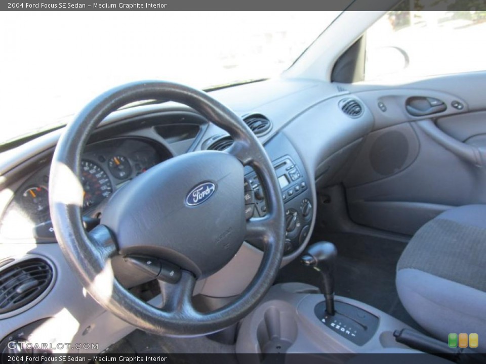 Medium Graphite Interior Dashboard for the 2004 Ford Focus SE Sedan #39715711