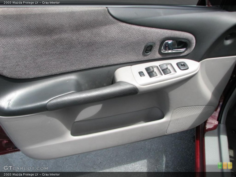 Gray Interior Door Panel for the 2003 Mazda Protege LX #39757782