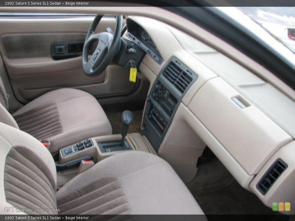 Beige Interior Dashboard for the 1992 Saturn S Series SL1 Sedan #39790330