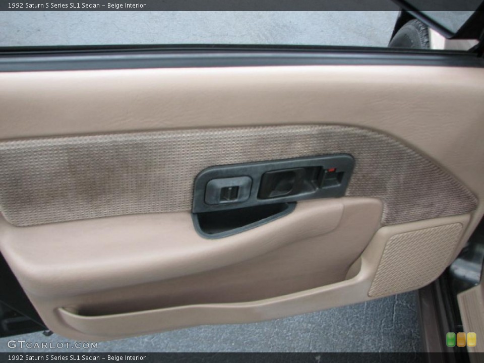 Beige Interior Door Panel for the 1992 Saturn S Series SL1 Sedan #39790442
