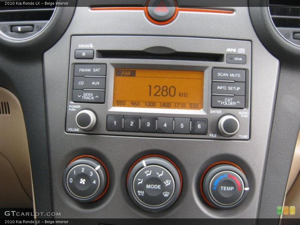 Beige Interior Controls for the 2010 Kia Rondo LX #39847742