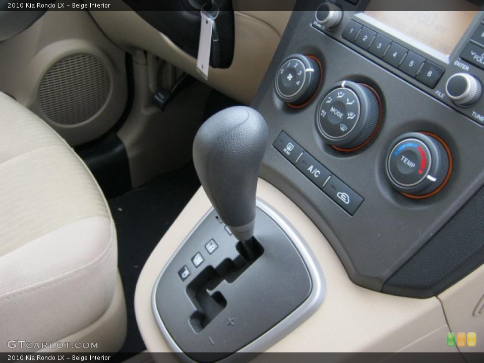 Beige Interior Transmission for the 2010 Kia Rondo LX #39847902