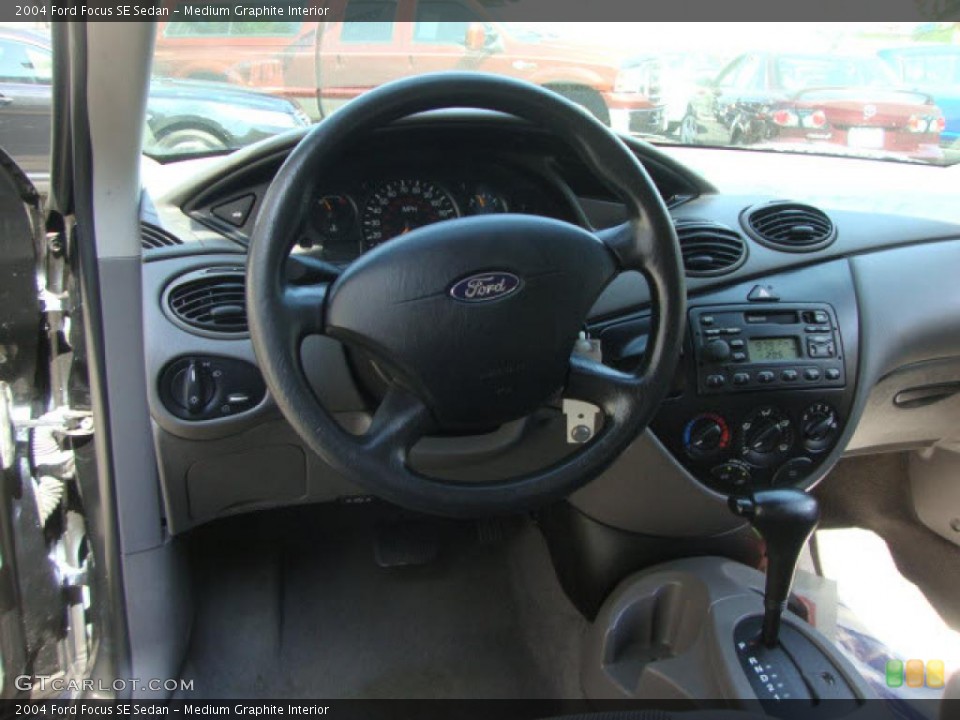 Medium Graphite Interior Dashboard for the 2004 Ford Focus SE Sedan #39861385