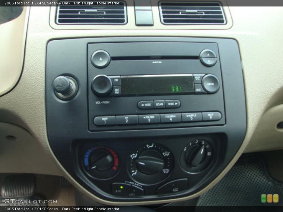 Dark Pebble/Light Pebble Interior Controls for the 2006 Ford Focus ZX4 SE Sedan #39861555
