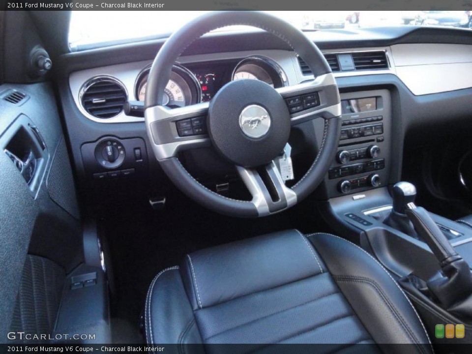 Charcoal Black Interior Prime Interior for the 2011 Ford Mustang V6 Coupe #39865179