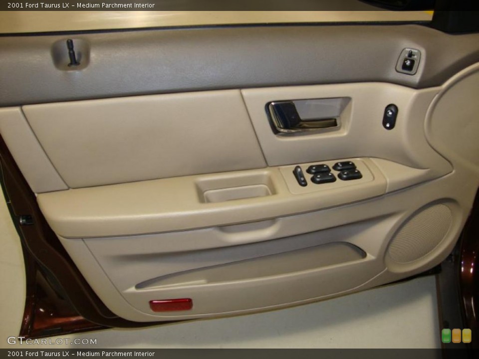 Medium Parchment Interior Door Panel for the 2001 Ford Taurus LX #39865551