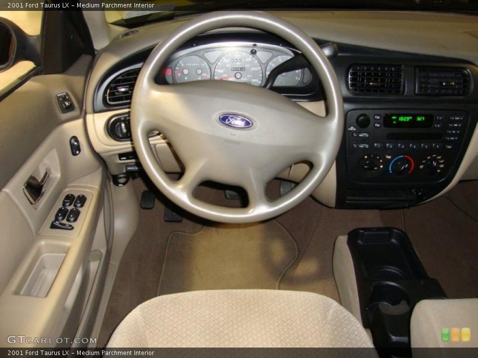 Medium Parchment Interior Steering Wheel for the 2001 Ford Taurus LX #39865727