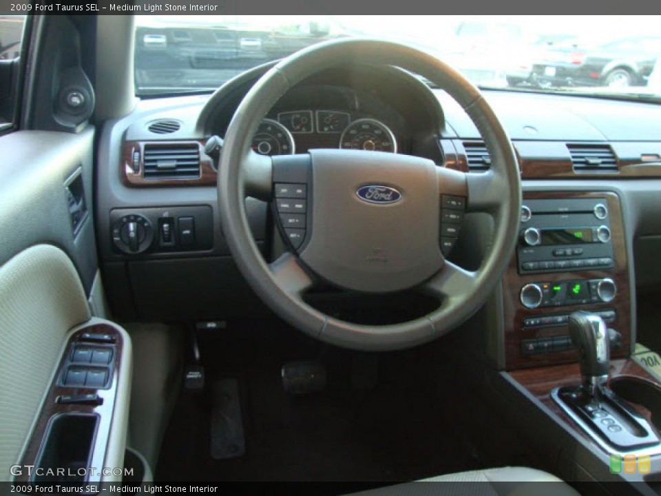 Medium Light Stone Interior Dashboard for the 2009 Ford Taurus SEL #39865847
