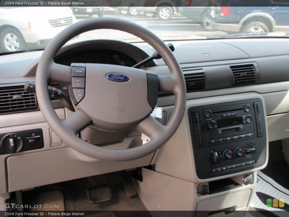 Pebble Beige Interior Dashboard for the 2004 Ford Freestar SE #39871415