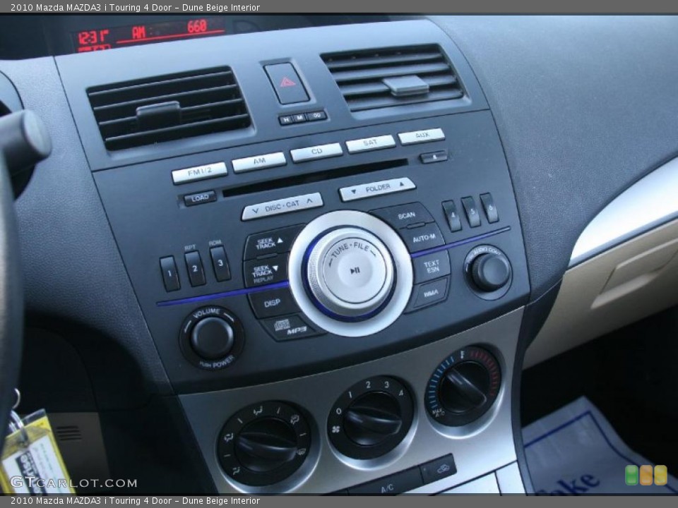 Dune Beige Interior Controls for the 2010 Mazda MAZDA3 i Touring 4 Door #39873844