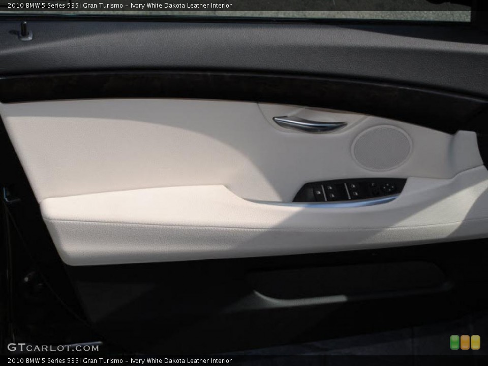 Ivory White Dakota Leather Interior Door Panel for the 2010 BMW 5 Series 535i Gran Turismo #39876587