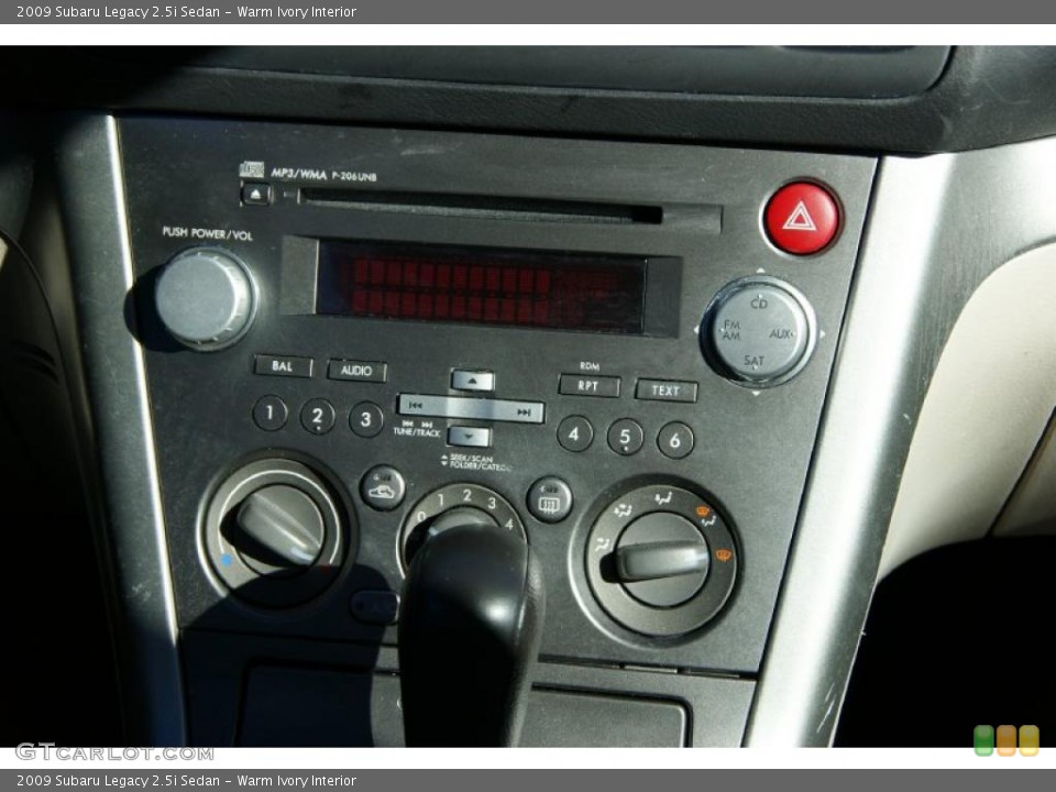 Warm Ivory Interior Controls for the 2009 Subaru Legacy 2.5i Sedan #39877243