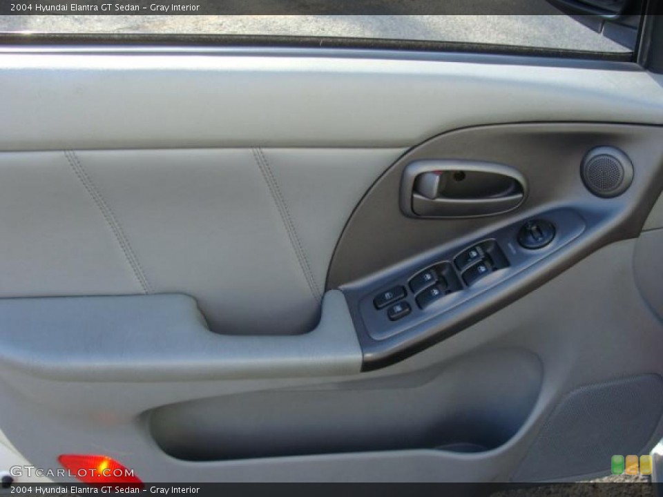 Gray Interior Door Panel for the 2004 Hyundai Elantra GT Sedan #39885060