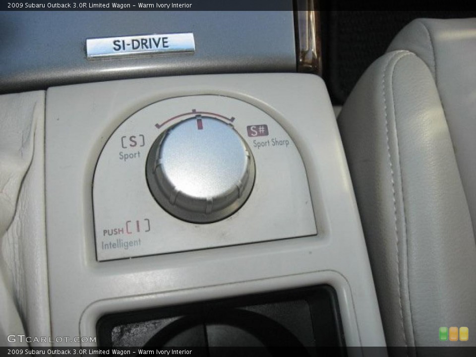 Warm Ivory Interior Controls for the 2009 Subaru Outback 3.0R Limited Wagon #39897299