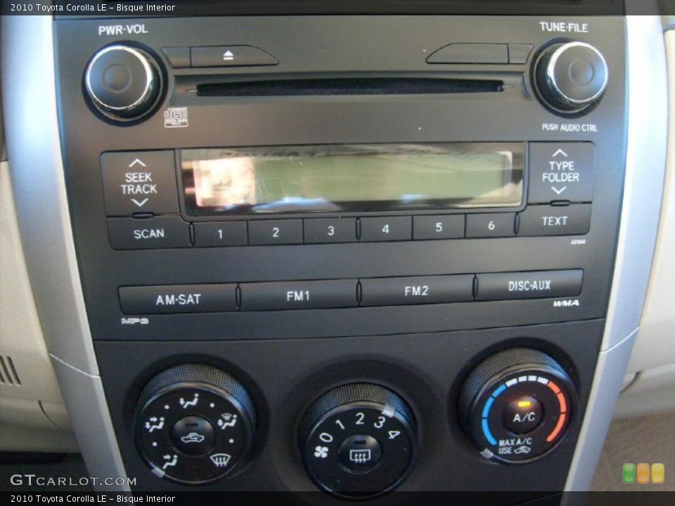 Bisque Interior Controls for the 2010 Toyota Corolla LE #39905139