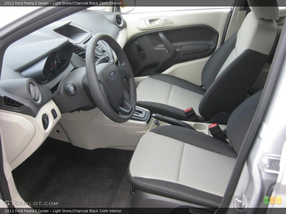 Light Stone/Charcoal Black Cloth Interior Prime Interior for the 2011 Ford Fiesta S Sedan #39937300