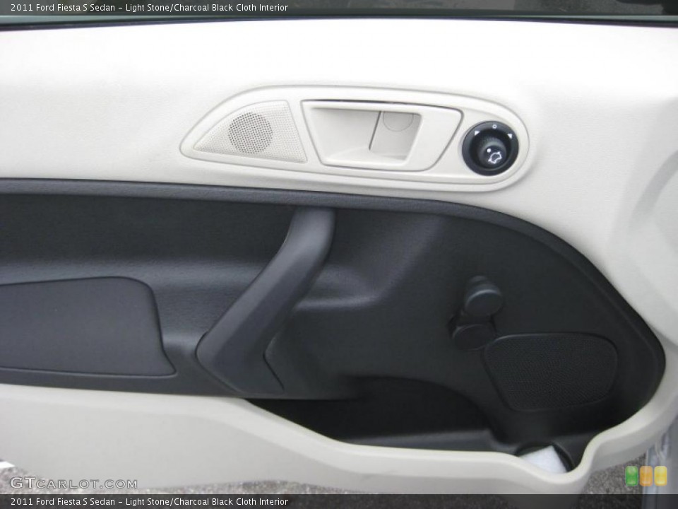 Light Stone/Charcoal Black Cloth Interior Door Panel for the 2011 Ford Fiesta S Sedan #39937332